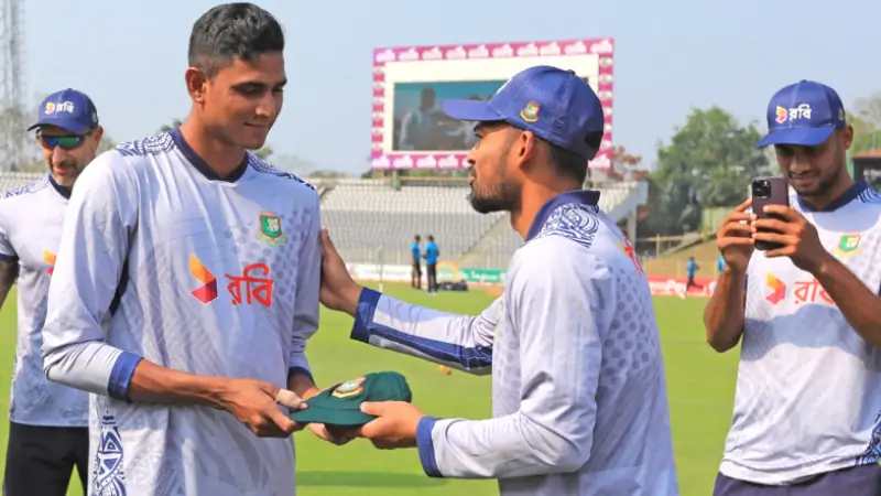 Nahid Rana takes debut cap from Nazmul Hossain Shanto