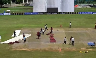 The ground staff work around the pitch and the outfield