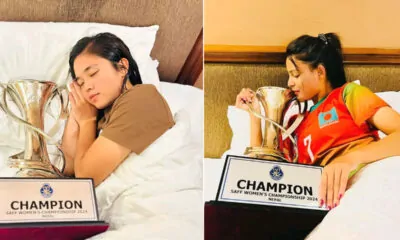 women footballer sleep with saff trophy