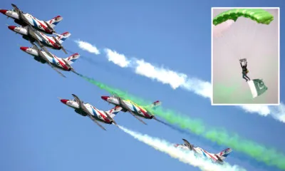 Pakistani jets perform aerobatic manoeuvres during the Pakistan Day military parade in Islamabad. ─AFP