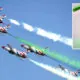 Pakistani jets perform aerobatic manoeuvres during the Pakistan Day military parade in Islamabad. ─AFP