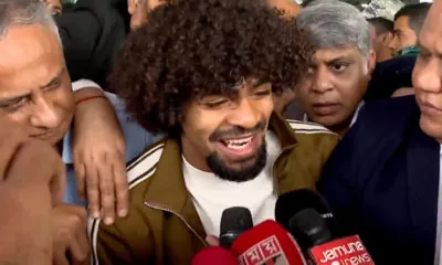 Hamza Choudhury infront of press