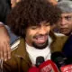 Hamza Choudhury infront of press