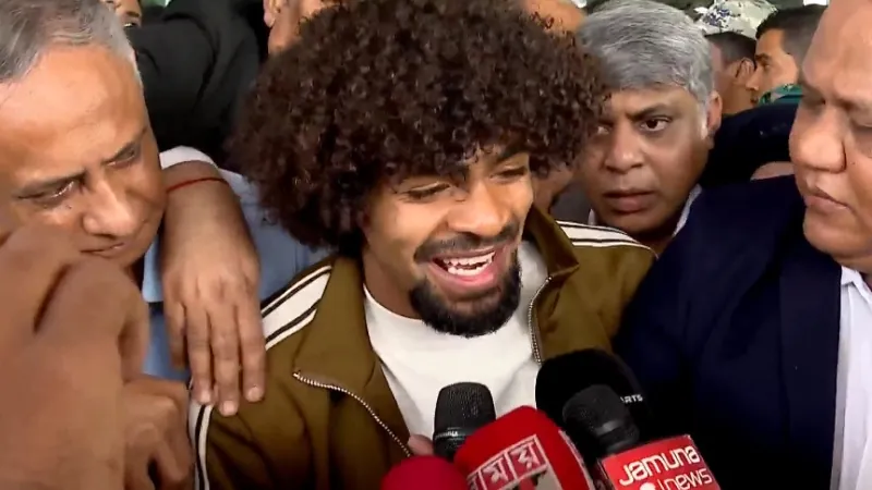 Hamza Choudhury infront of press