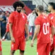 Hamza Choudhury with teammates in practice