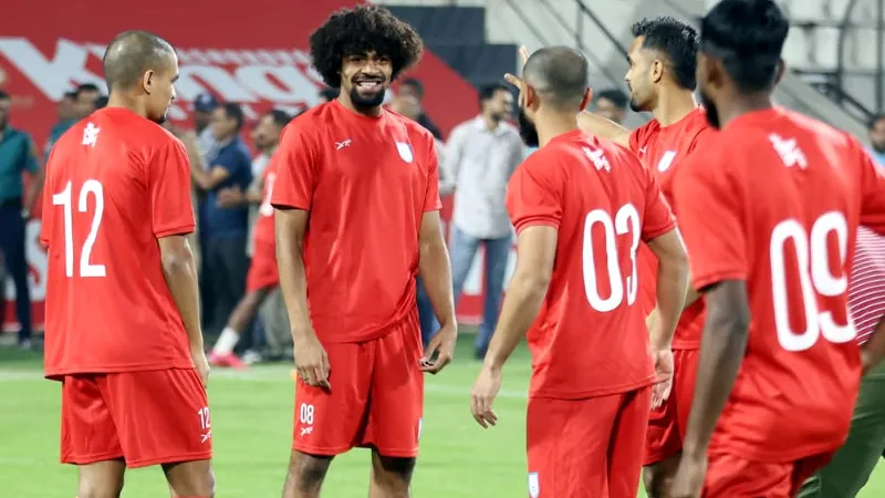 Hamza Choudhury with teammates in practice